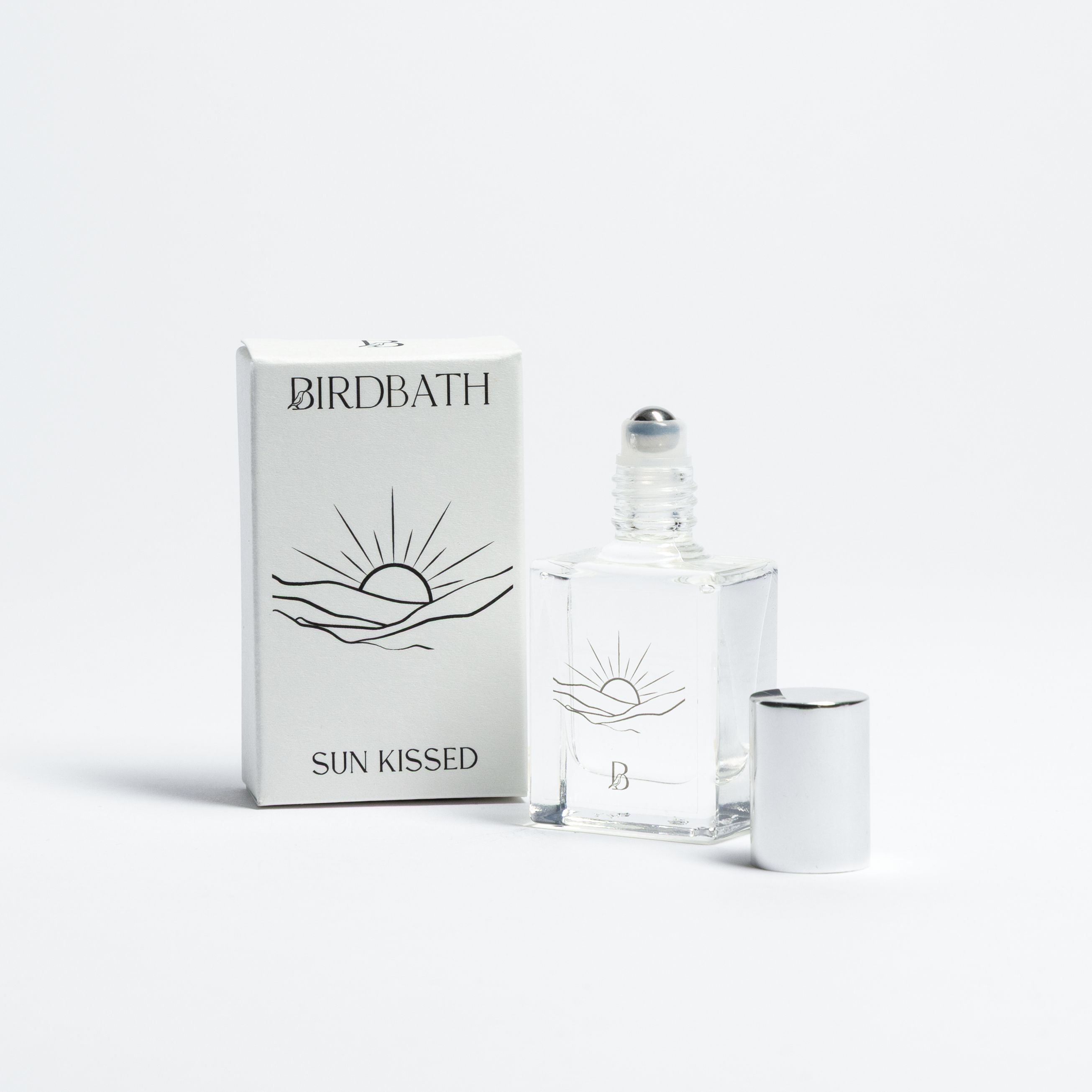 Birdbath Sun Kissed perfume bottle and packaging on a white background