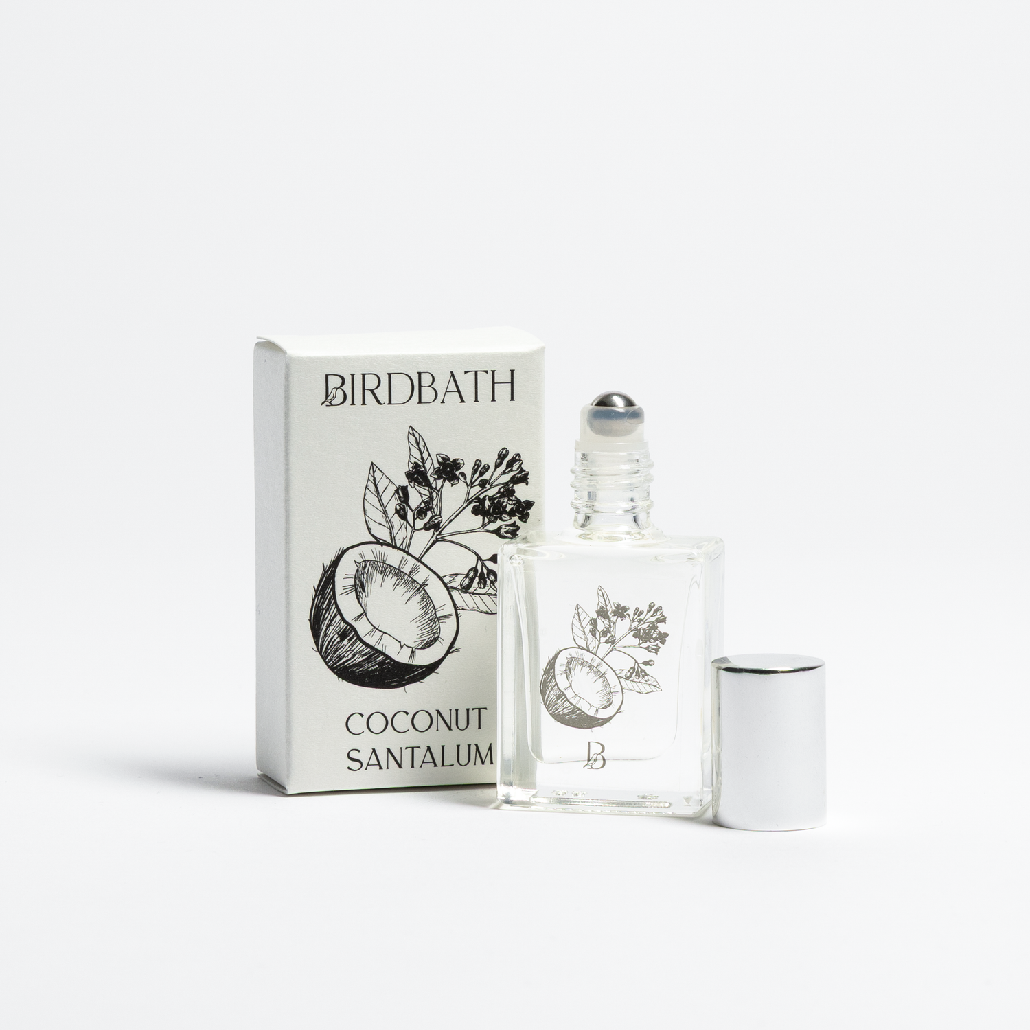 Birdbath Coconut Santalum Roll-on Perfume bottle with packaging on a white background.