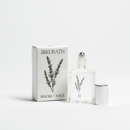 Birdbath Hinoki + Sage perfume bottle and packaging on a white background