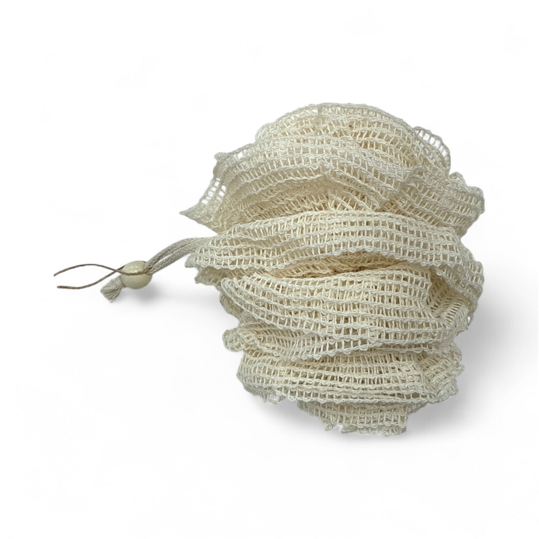 Beige bath pouf on a white background