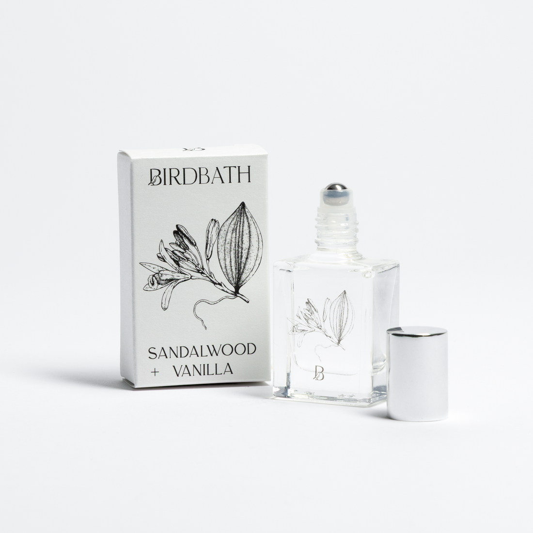 Birdbath Sandalwood Vanilla perfume bottle and packaging on a white background