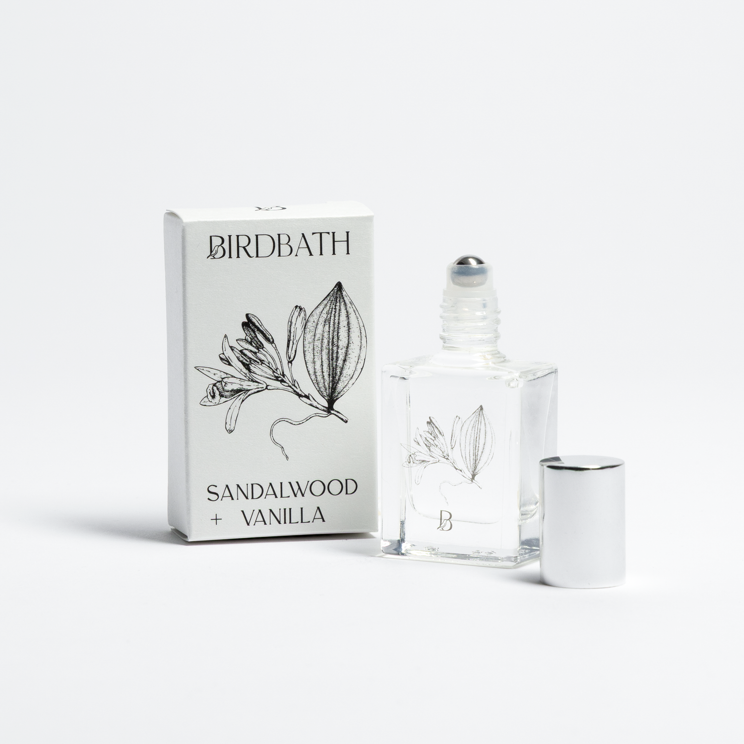 Birdbath Sandalwood Vanilla perfume bottle and packaging on a white background