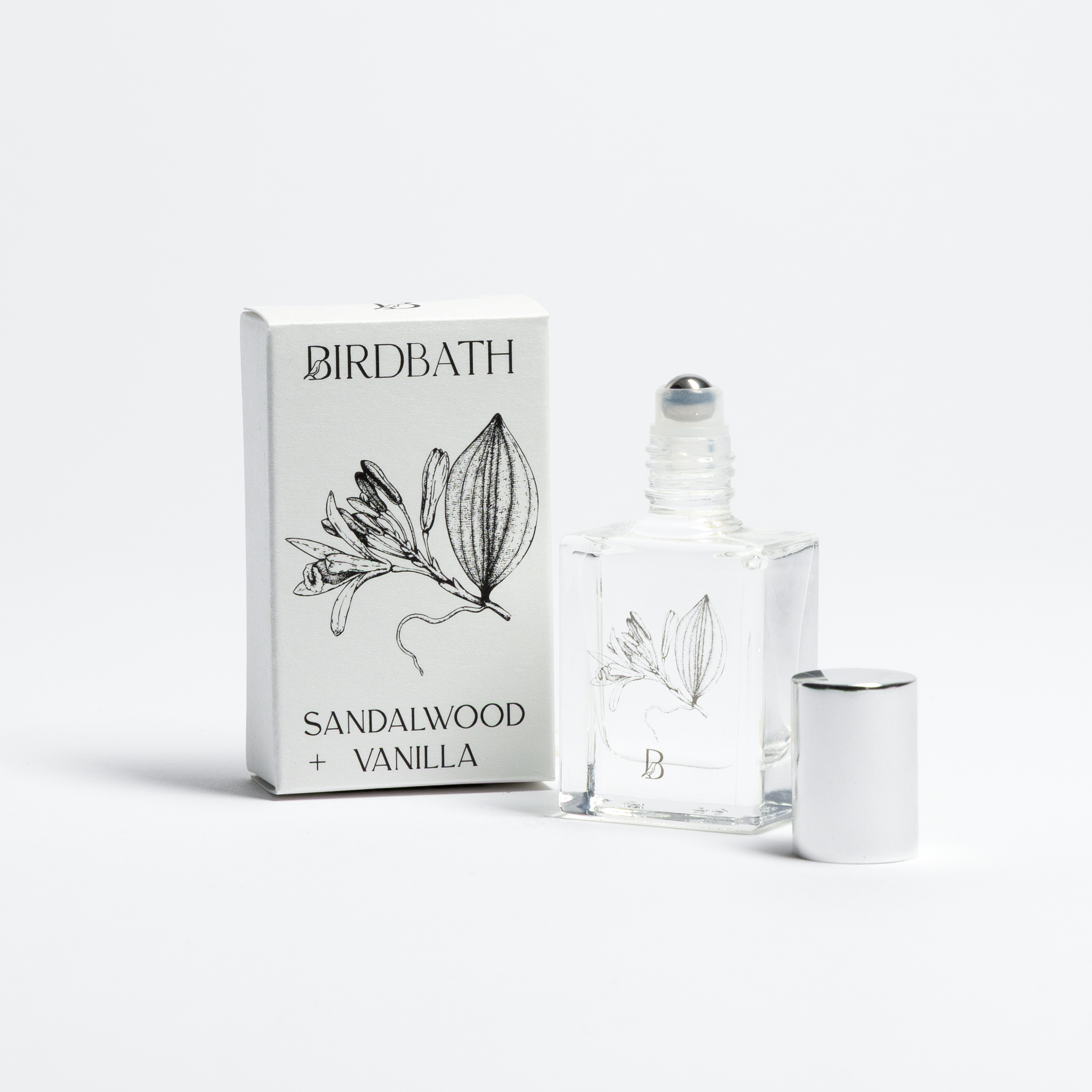 Birdbath Sandalwood Vanilla perfume bottle and packaging on a white background