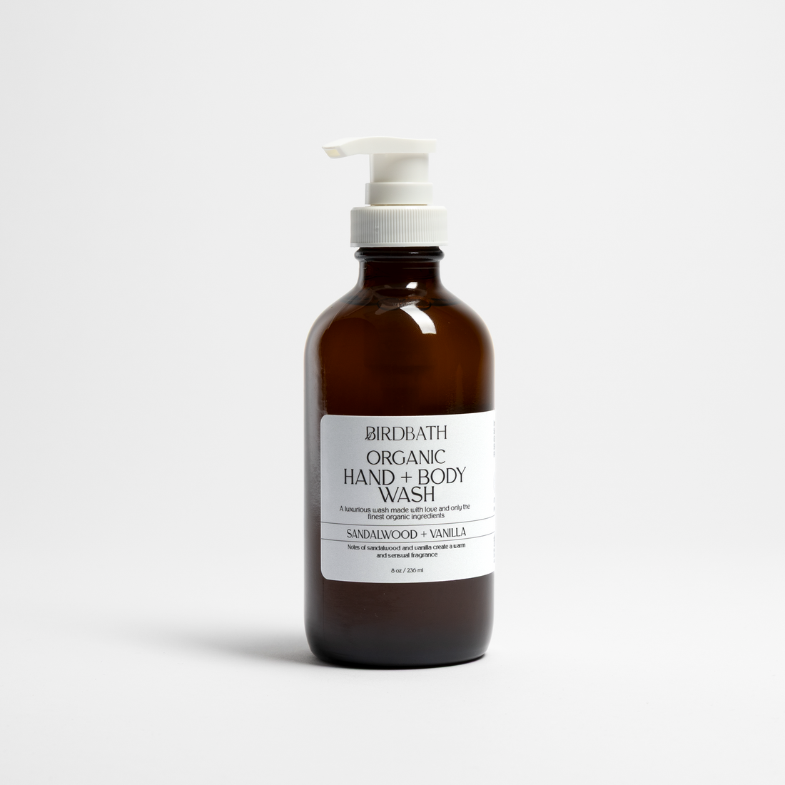 Bottle of Birdbath Sandalwood + Vanilla Organic Hand + Body Wash on a white background