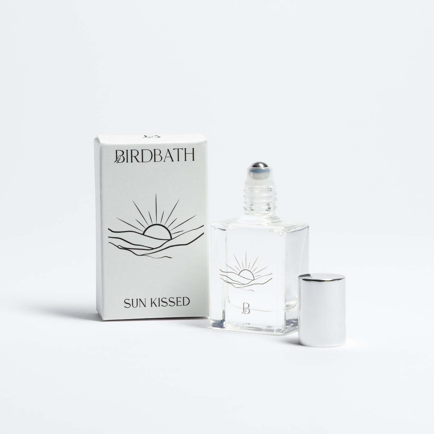 Birdbath Sun Kissed perfume bottle and packaging on a white background