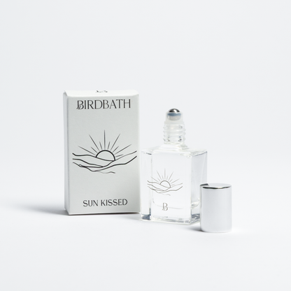 Birdbath Sun Kissed perfume bottle and packaging on a white background