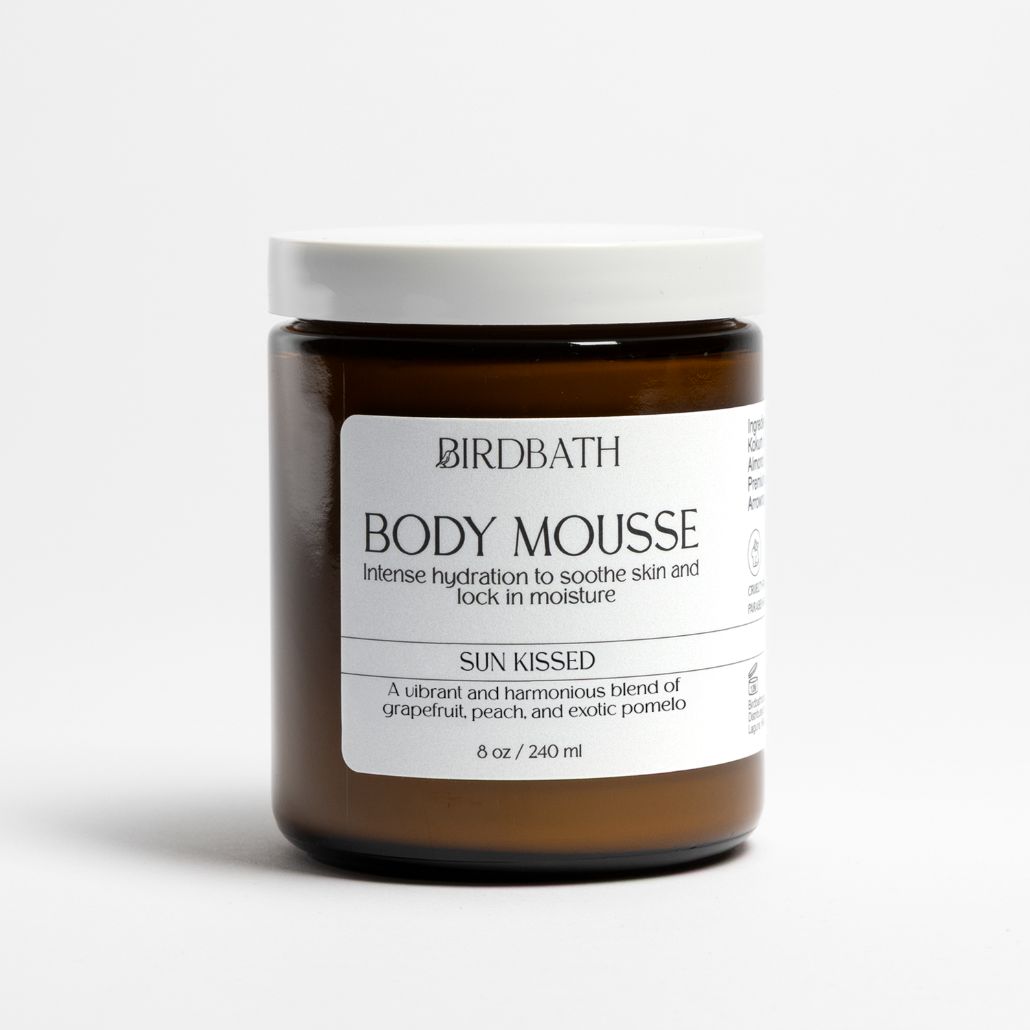 Birdbath Sun Kissed Body Mousse in an amber jar on a white background.