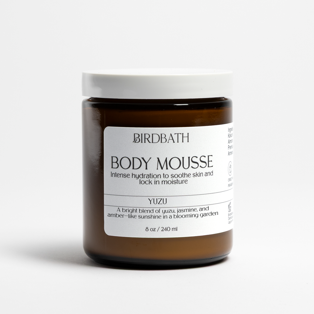 Birdbath Yuzu Body Mousse in a white jar with a minimalist label.