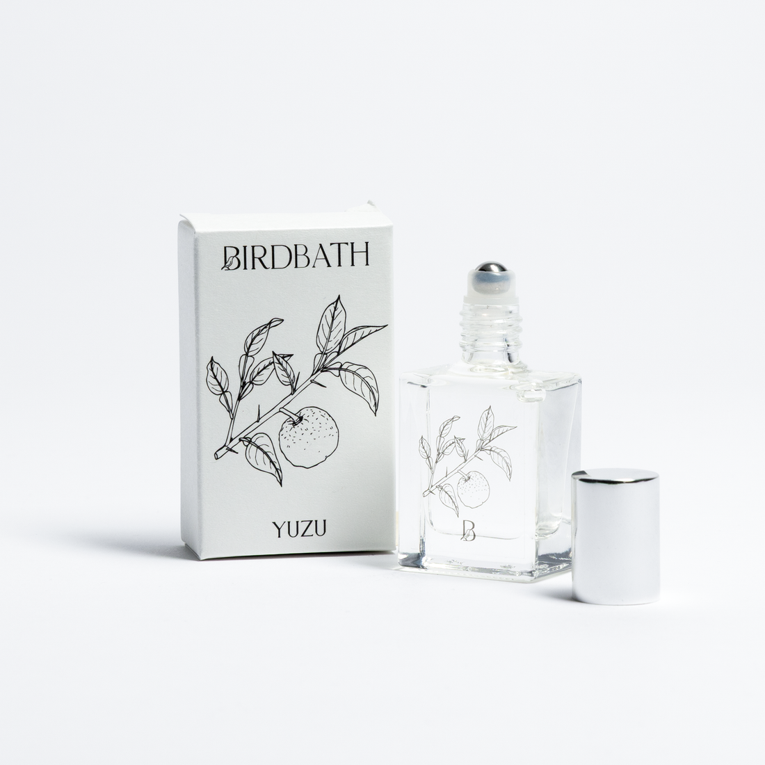 Birdbath Yuzu perfume bottle and packaging on a white background