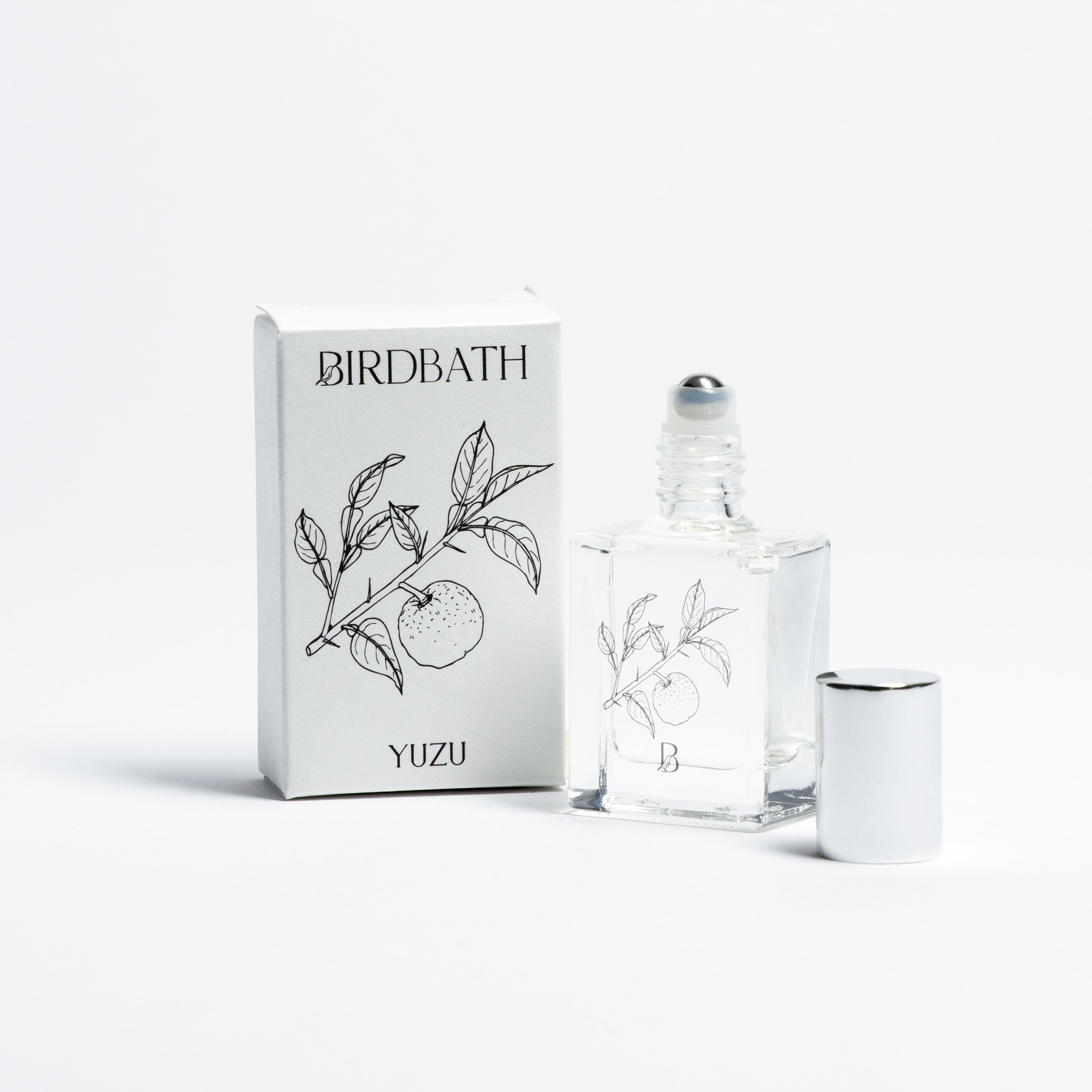 Birdbath Yuzu perfume bottle and packaging on a white background
