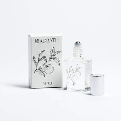 Birdbath Yuzu perfume bottle and packaging on a white background